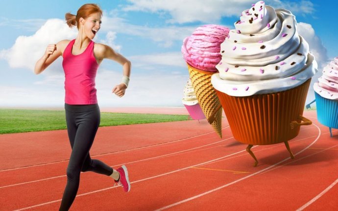 Woman running away from sweets